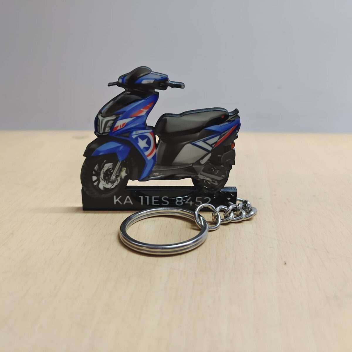 Customized TVS Ntorq 125 Combat Blue Colorful Scooter Shape Gel Number Plate Keychain (2)